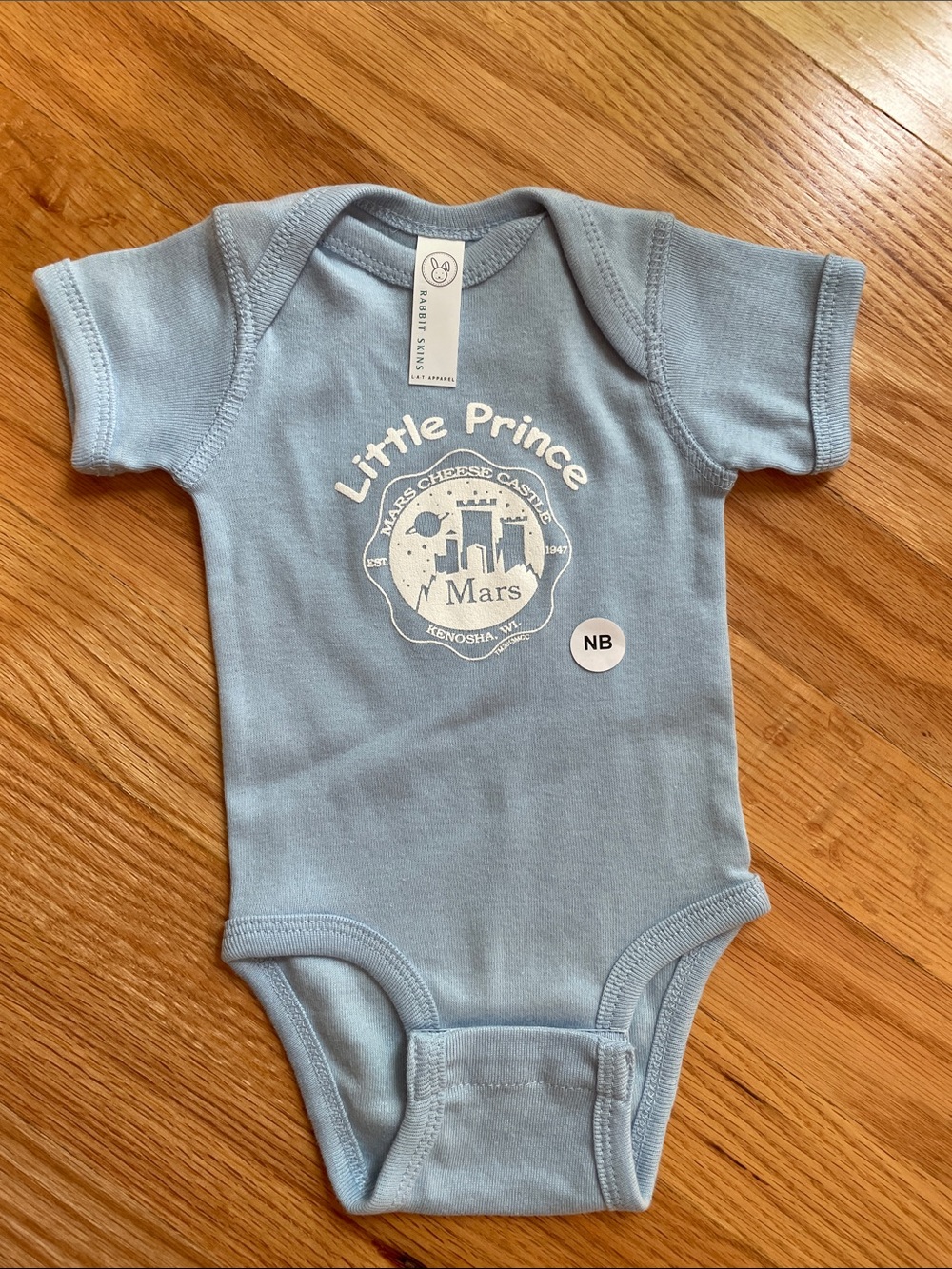 Mars Cheese Castle Newborn Onesie